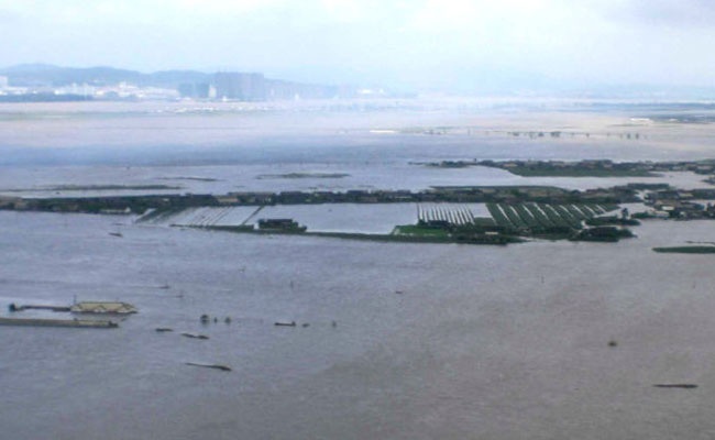 Four people are dead, one is missing and more than 64,000 others were forced to evacuate their homes Saturday after the swollen Yalu River, which marks the border with the Democratic People&apos;s Republic of Korea (DPRK), flooded Dandong City in northeast China&apos;s Liaoning Province.