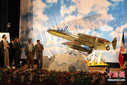 Iranian President Mahmoud Ahmadinejad on Sunday unveiled a home-made unmanned long-range bomber drone.