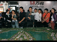 A real estate trade fair held in Shenzhen in 2008. Shenzhen is the first city to carry out the housing reform. [QQ.com]