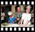 A family dinner for children from China, US and Canada in Shenzhen in 2004.