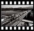 Hong Kong container vehicles cross the Shenzhen River in 1996.