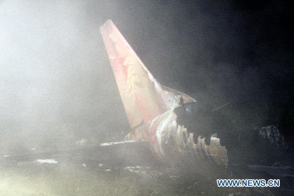 The wreckage of a crashed passenger plane is seen in Yichun City, northeast China&apos;s Heilongjiang Province, Aug. 25, 2010. The bodies of 43 passengers were recovered from the wreckage of the crashed passenger plane in northeast China&apos;s Heilongjiang Province late Tuesday, a local publicity official told Xinhua early Wednesday. (Xinhua/Li Guangfu) 