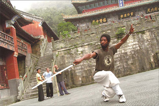 American Raphael Robert Zanders-McNeil practices Wudang jianfa at the Wudang Taoist Kungfu Academy on Mount Wudang, Hubei Province. (Source: China Daily) 