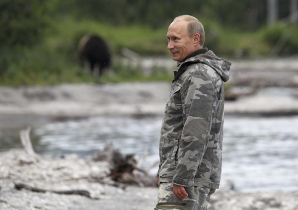Russia's Putin braves rough seas to study whales