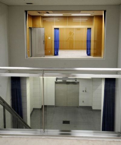 An execution chamber is pictured from the viewing room at the Tokyo Detention Center in Tokyo An execution chamber (top) is pictured from the viewing room at the Tokyo Detention Center in Tokyo August 27, 2010. Japan opened up its gallows for the first time to domestic media on Friday, a move that could spark public debate over executions in a country where a hefty majority supports retaining the death penalty. (Xinhua/Reuters)