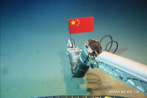 The file photo shows the submersible 'Jiaolong' catching a sample of deep sea's living beings during one dive in the South China Sea in July of 2010. [Xinhua]