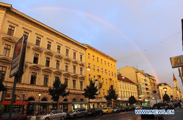 A rainbow is seen in the sky after a shower in Vienna, capital of Austria, Aug. 27, 2010. [Xinhua/Xu Liang]