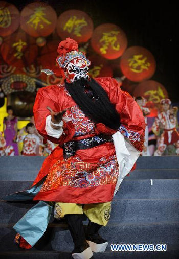 An artist performs at the opening ceremony of the 5th China Qinqiang Opera Arts Festival in Xi'an, capital of northwest China's Shaanxi Province, Aug. 28, 2010. 