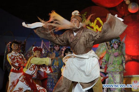 Artists perform at the opening ceremony of the 5th China Qinqiang Opera Arts Festival in Xi'an, capital of northwest China's Shaanxi Province, Aug. 28, 2010. Photo: Xinhua