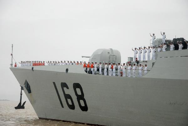 Chinese naval soldiers and officers of destroyer Guangzhou stand in formation on board upon their arrival at Myanmar Yangon's Thilawa Port, Aug. 29, 2010. The 5th Escort Task group of the Chinese People's Liberation Army (PLA)-Navy, made up of two warships -- 'Guanhzhou' and 'Chaohu' made a friendly call at Myanmar Yangon's Thilawa Port Sunday afternoon. [Xinhua] 