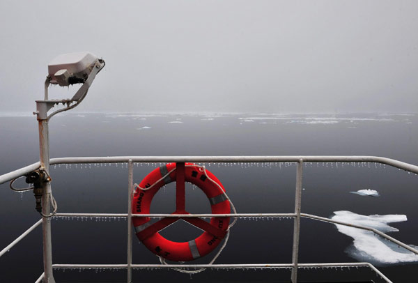 The icebreaker Xuelong, or Snow Dragon, sails through floe ice in the Arctic, Aug 28, 2010.