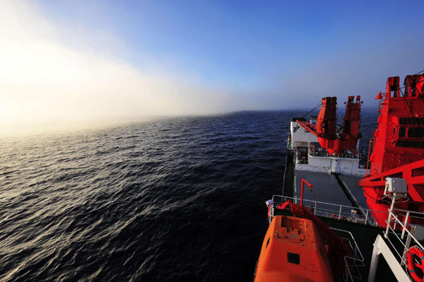 The icebreaker Xuelong, or Snow Dragon, sails near a spot at 74 degrees north latitude on the Arctic Ocean, Aug 29, 2010. 