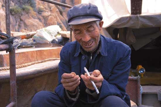 Li family member Wei Yingquan on his boat.