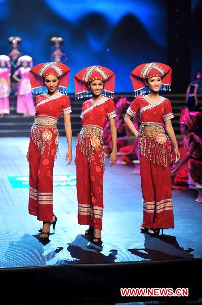 Contestants presents ethical dresses of Zhuang ethnic group at the Fifth Asian Super Model Contest held in Nanning, capital of southwest China's Guangxi Zhuang Autonomous Region, Aug. 30, 2010. The second competition of the Fifth Asian Super Model Contest was held there on Monday. A total of 36 contestants from ten countries and regions attended the contest.