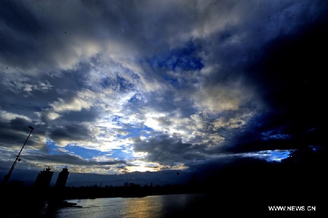 Heavy clouds are seen over the Fuzhou City, capital of southeast China's Fujian Province, Aug. 31, 2010. 