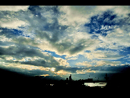 Storm clouds gather over the Fuzhou in East China's Fujian province on August 31, 2010. One typhoon and two tropical storms are forecast to land or brush past East and South China coasts on Tuesday and Wednesday. The converging forces will bring heavy rain to the region as they move further northwest. [Xinhua]