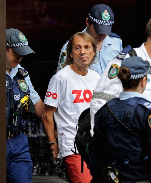 A French skyscraper climber dubbed &apos;Spiderman&apos; was arrested after scaling a 57-story building in Sydney with his bare hands, August 30, 2010. Alain Robert, 47 years old, known for climbing some of the world&apos;s tallest and best-known buildings without ropes or other equipment, frequently climbs skyscrapers throughout the world. [Xinhua/AFP]