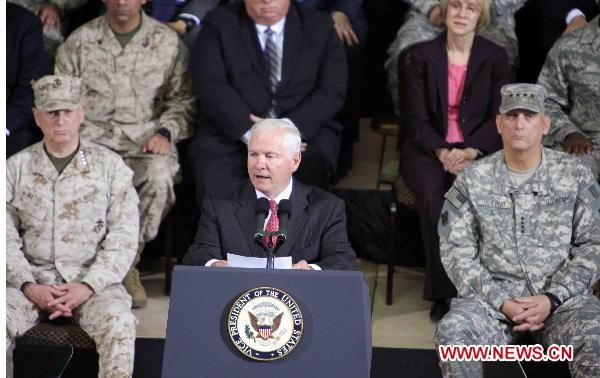 U.S. Defense Secretary Robert Gates speaks during a change of command ceremony at Camp Victory U.S. military base in Baghdad, Iraq, Sept. 1, 2010. [Xu Yanyan/Xinhua]