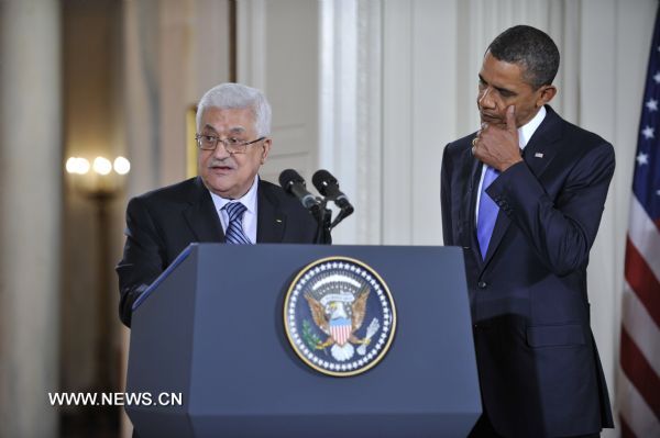 Palestinian National Authority (PNA) Chairman Mahmoud Abbas (L) speaks during a press conference about the Middle East peace talks as U.S. President Obama looks on at the East Room of the White House in Washington D.C., capital of the United States, Sept. 1, 2010. [Zhang Jun/Xinhua]