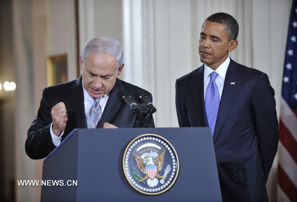 Israeli Prime Minister Benjamin Netanyahu (L) speaks during a press conference about the Middle East peace talks as U.S. President Obama looks on at the East Room of the White House in Washington D.C., capital of the United States, Sept. 1, 2010. [Zhang Jun/Xinhua]