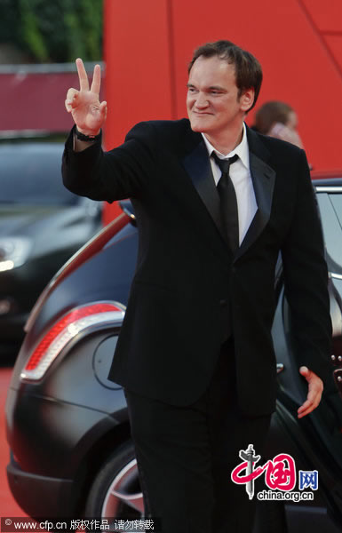 Jury president Quentin Tarantino arrives for the opening ceremony at the 67th edition of the Venice Film Festival in Venice, Italy, Wednesday, Sept. 1, 2010.