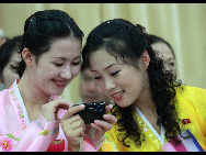 The DPRK performers from Pyongyang Art Troupe, dressed in traditional costumes, at the China Oriental Arts Group in Beijing during their touring trip to China, September 1, 2010. [Xinhua]