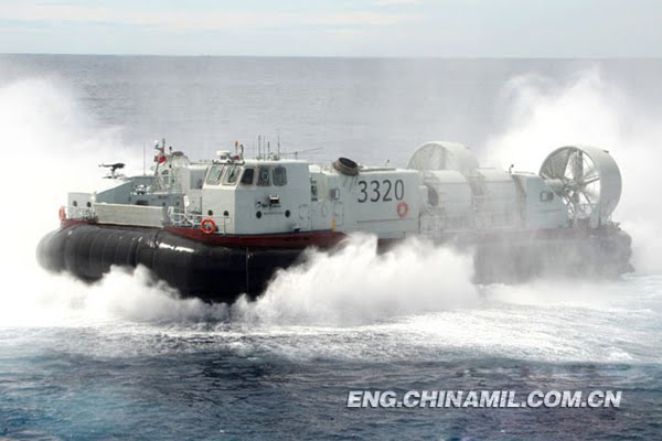 An air-cushion craft of the Navy of the Chinese People&apos;s Liberation Army (PLA) is seen sail towards the blue sea for the first time during a ship-craft coordination exercise on July 6,2010. It is learned that this type of air-cushion craft is the first model of medium shipboard air-cushion craft the PLA Navy has been formally equipped with which marks that PLA Navy has realized leapfrog development of being directly equipped with air-cushion craft of above 100 tons from null. [eng.chinamil.com.cn]