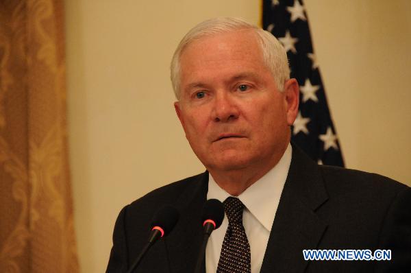 U.S. Secretary of Defense Robert Gates attends a press conference with Afghan President Hamid Karzai (unseen) after their meeting in Kabul, Afghanistan, Sept. 2, 2010. Gates arrived in Kabul on Thursday for an unannounced visit. [Wang Yan/Xinhua]