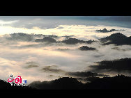 Mount Langshan is one of China's National Geological Park famous for its unique Danxia landform. It is located in Xinning county, Hunan province. In the south Mount Langshan is connected with Guilin, in the north it echoes Zhangjiajie. Three limestone caves and formative forest attracts many people to come. [Photo by Guan Peng]