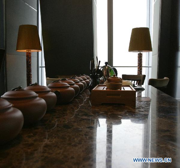 The photo taken on Sept. 3, 2010 shows a bar on the 80th floor of the skyscraper China World Trade Center Tower in Beijing, capital of China. As the tallest skyscraper in Beijing, the 330-meter-high China World Trade Center Tower was completed and put into use on Aug. 30. [Xinhua]