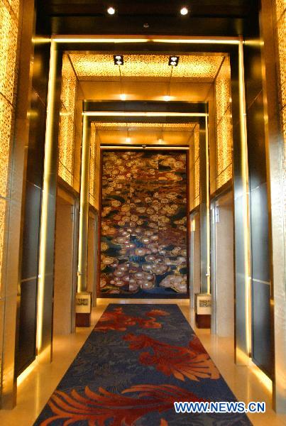 The photo taken on Sept. 3, 2010 shows the elevator corridor of the skyscraper China World Trade Center Tower in Beijing, capital of China. As the tallest skyscraper in Beijing, the 330-meter-high China World Trade Center Tower was completed and put into use on Aug. 30. [Xinhua]