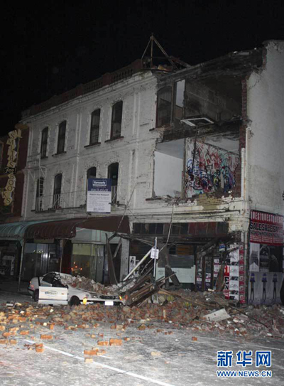 A car hit by fallen rubble in Christchurch, New Zealand after a powerful earthquake struck much of its South Island early Saturday Sept. 4 2010. [Xinhua]