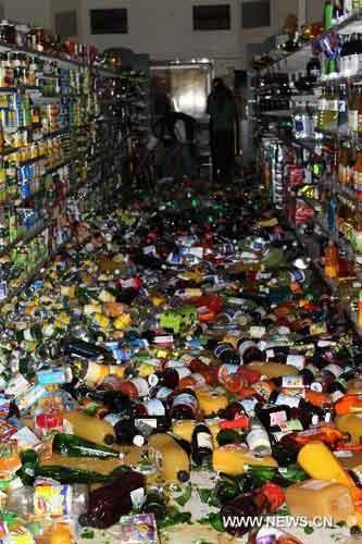 Goods scatter on the ground after falling from shelves in the earthquake in Christchurch, New Zealand, Sept. 4, 2010. [Xinhua]