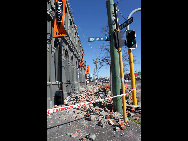 Rubble from a quake-damaged building is pictured on a street in Christchurch September 4, 2010.[Xinhua] 