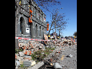 Rubble from a quake-damaged building is pictured on a street in Christchurch September 4, 2010.[Xinhua] 