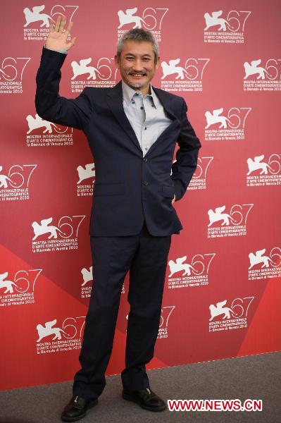 Director Tsui Hark poses during the 'Detective Dee and the Mystery of the Phantom Flame' red carpet event at the 67th Venice Film Festival Sept.5, 2010.
