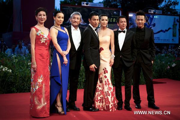 (From L to R) Chinese film producer Nansun Shi, actress Carina Lau, director Tsui Hark, actor Andy Lau, actress Li Bingbing, producer Wang Zhonglei and actor Deng Chao arrive for the screening of 'Di Renjie Zhi Tong Tian Di Guo (Detective Dee and the mystery of Phantom Flame)' at the 67th Venice Film Festival in Venice, Italy, Sep. 5, 2010.