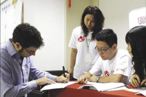 Will Sameuls, 38, from the US, registers his information at a residents' committee in Beijing. 