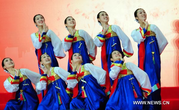 Artists from the Democratic People's Republic of Korea (DPRK) perform duing a ceremony marking the National Pavilion Day for the DPRK at the 2010 World Expo in Shanghai, east China, Sept. 6, 2010. 