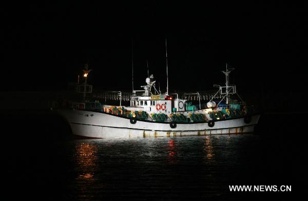 South Korean fishing boat &apos;Daeseung 55&apos;, with three Chinese and four South Korean crew members on board, arrives in Sokcho, South Korea, on Sept. 7, 2010. South Korean fishing boat &apos;Daeseung 55&apos;, released on Tuesday by the Democratic People&apos;s Republic of Korea (DPRK), arrived in South Korea&apos;s port city of Sokcho in the evening. [Xinhua]