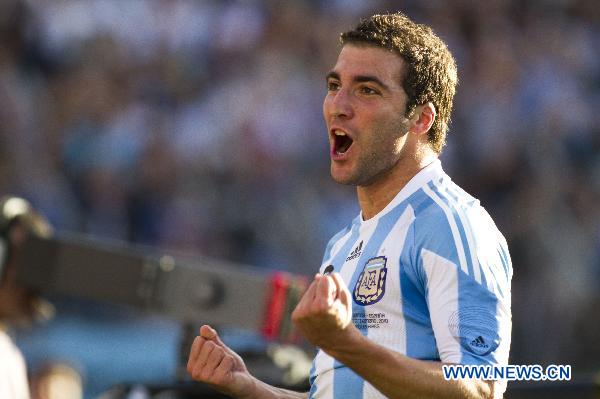 Argentina's Gonzalo Higuain celebrates after scoring a goal during the friendly soccer match against Spain in Buenos Aires, Argentina, Sept. 7, 2010. (Xinhua/Martin Zabala)