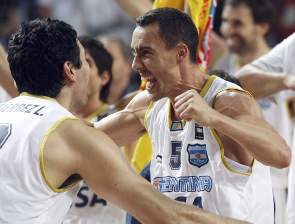 Argentina's Pablo Prigioni (R) and Leonardo Gutierrez (L) celebrate at the end of their game against Brazil during FIBA Basketball World Championship in Istanbul September 7, 2010. Argentina beat Brazil 93-89. (Xinhua/Reuters Photo)
