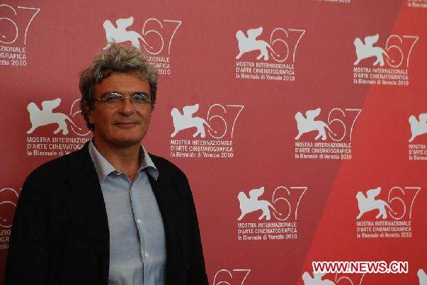 Italian director Mario Martone poses during a photocall of 'Noi credevamo' at the 67th Venice Film Festival at Venice Lido, Italy, on Sept. 7, 2010.