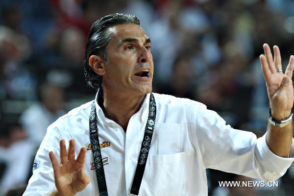 Spain's coach Sergio Scariolo gestures during the quarterfinal match against Serbia in the 2010 FIBA Basketball World Championship in Istanbul, Turkey, Sept. 8, 2010. Spain was disqualified for the semifinal after losing to Serbia 89-92. (Xinhua/Cai Yang)