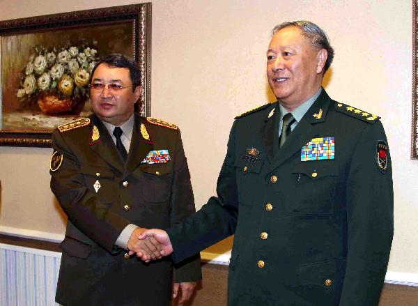 Chen Bingde (R), chief of the General Staff of the Chinese People's Liberation Army, meets with Saken Zhasuzakov, first deputy defense minister and chief of the staff of Kazakhstan's Armed Forces, in Almaty, Kazakhstan, Sept. 9, 2010. Chen visited Almaty on Thursday to attend the opening ceremony of the 'Peace Mission - 2010' anti-terrorism military exercise, which is launched under the framework of the Shanghai Cooperation Organization in south Kazakhstan from Sept. 9 to 25. [Wang Jianmin/Xinhua]