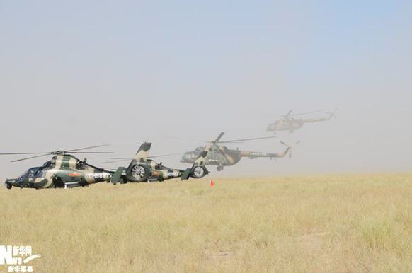 Chinese helicopters arrive in Kazakhstan for the SCO anti-terror drill, &apos;Peace Mission 2010&apos;.[Xinhua]