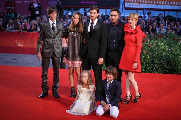 Film director Saverio Costanzo (2nd R Rear), actress Alba Rohrwacher (1st R Rear) and actor Luca Marinelli (3rd R Rear) arrive for the screening of 'La solitudine dei numeri primi' at the 67th Venice Film Festival in Venice, Italy, on Sept. 9, 2010.