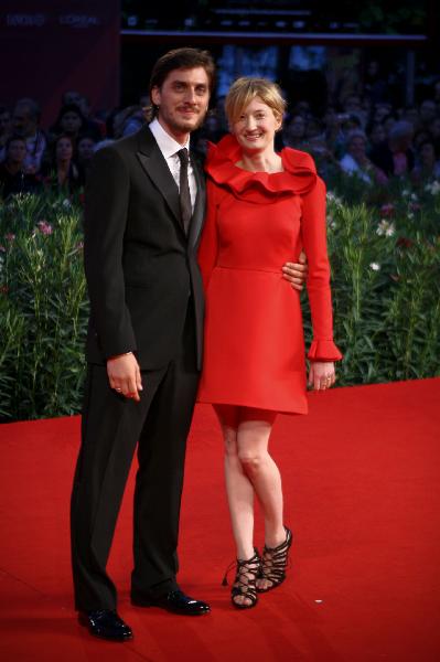 Italian actress Alba Rohrwacher (R) and actor Luca Marinelli arrive for the screening of 'La solitudine dei numeri primi' at the 67th Venice Film Festival in Venice, Italy, on Sept. 9, 2010.