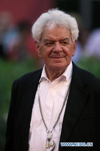 Actor Gianni Schicch of Italian film 'Sorelle Mai' arrives at the red carpet at the 67th Venice Film Festival, Sept. 9, 2010.