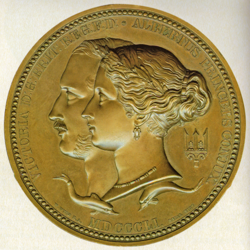 A gold medal from the 1851 London Great Exhibition features the image of Queen Victoria and Prince Albert
